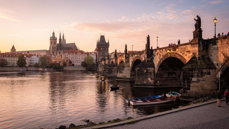 Charles Bridge and the Vltava river in Prague in early morning light